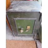 A cast iron safe with a key and internal drawer - 60cm H x 46cm W x 45cm D