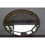 A good 19th century oval gilt framed marginal mirror with original 1/4 plate glass sections, fully