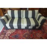 A Bielefelder Werkstatten grey and cream two seater sofa in ex show house condition, 85cm tall x