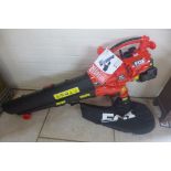 A two stroke petrol fox Wolf 31cc blower, vacuum in very good condition, only used a few times