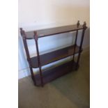 A mahogany hanging shelf, 70cm high x 78cm wide