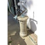 An armillary style sundial on a stone effect column - 132cm tall