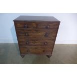 A 19th century mahogany chest of small proportions with two short over three long drawers on