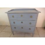 An 20th Swedish Gustavian style blue painted chest of three drawers with reeded detail to drawers