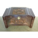 A nice quality Chinese camphor lined trunk, elegantly carved with sailing ships, complete with