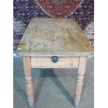 A 19th century pine table with a drawer, 111cm long x 66cm deep