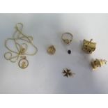 Three 9ct gold charms, a 9ct pendant and a 9ct ring, total weight approx 21.8 grams, and an 18ct