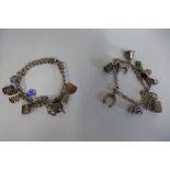 Two silver charm bracelets, approx 1.8 troy oz, in good condition but with some usage marks