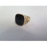 A 9ct gold gents signet ring, approx 5.5 grams, size W, generally good, slight bending to shank