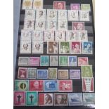 A collection of unmounted mint German Berlin stamps in a stock-book with sets, part sets and singles