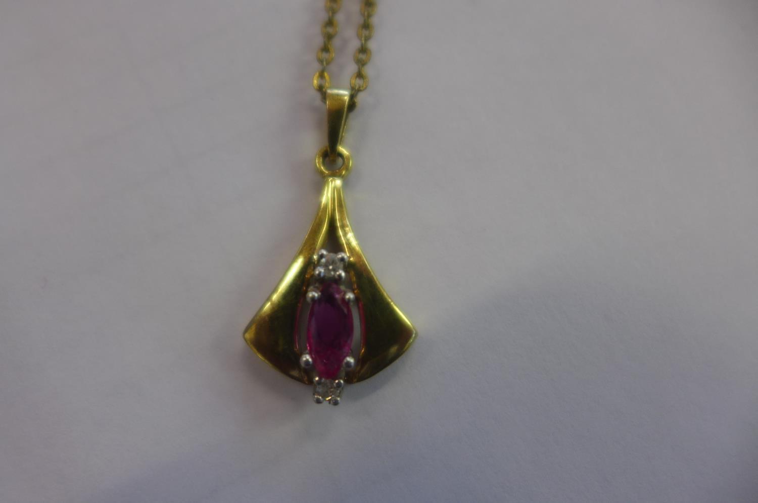 A 9ct Ruby and diamond pendant on a gilt metal chain, total weight approx 2.9 grams - Image 2 of 2