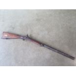 A percussion cap rifle, the barrel numbered 147, 118cm long, general wear and some old repairs