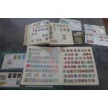 A collection of assorted world stamps and 1st day covers, in four albums with some loose