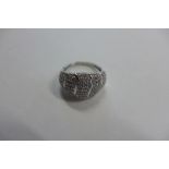A 9ct white gold diamond cluster ring, size N, approx 3.5 grams, some usage marks