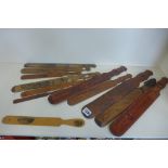 A collection of eleven carved paper knives, and a souvenir knife, longest 46cm