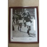 A framed 16x20 inch photo of England celebrating winning the 1966 World cup final, signed by