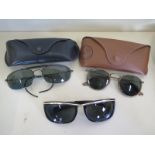 Two pairs of USA made vintage Rayban sunglasses, with b and L lenses, one pair are 1992 Olympic