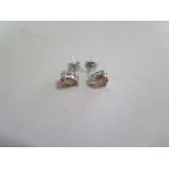 A pair of 18ct white gold earrings, approx 1.6 grams, in good condition