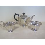 A silver three piece tea set, Sheffield 1930/31 - 1931/32, Maker EV - total weight approx 22 troy