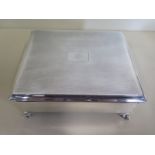 A large silver casket with engine turned decoration to lid, Fluer de lyes to centre of lid, on