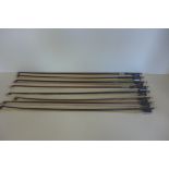 A collection of eight assorted violin bows