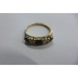 A 9ct gold sapphire and diamond ring, size Q, approx 2.6 grams