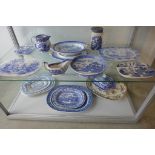 a collection of 19th and 20ct century blue and white table ware, including four strainers and a