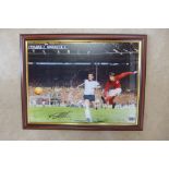 A framed 16x12 inch 1966 World Cup final print of Geoff Hurst scoring Englands fourth goal, signed
