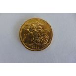 An Elizabeth II full gold sovereign dated 1965