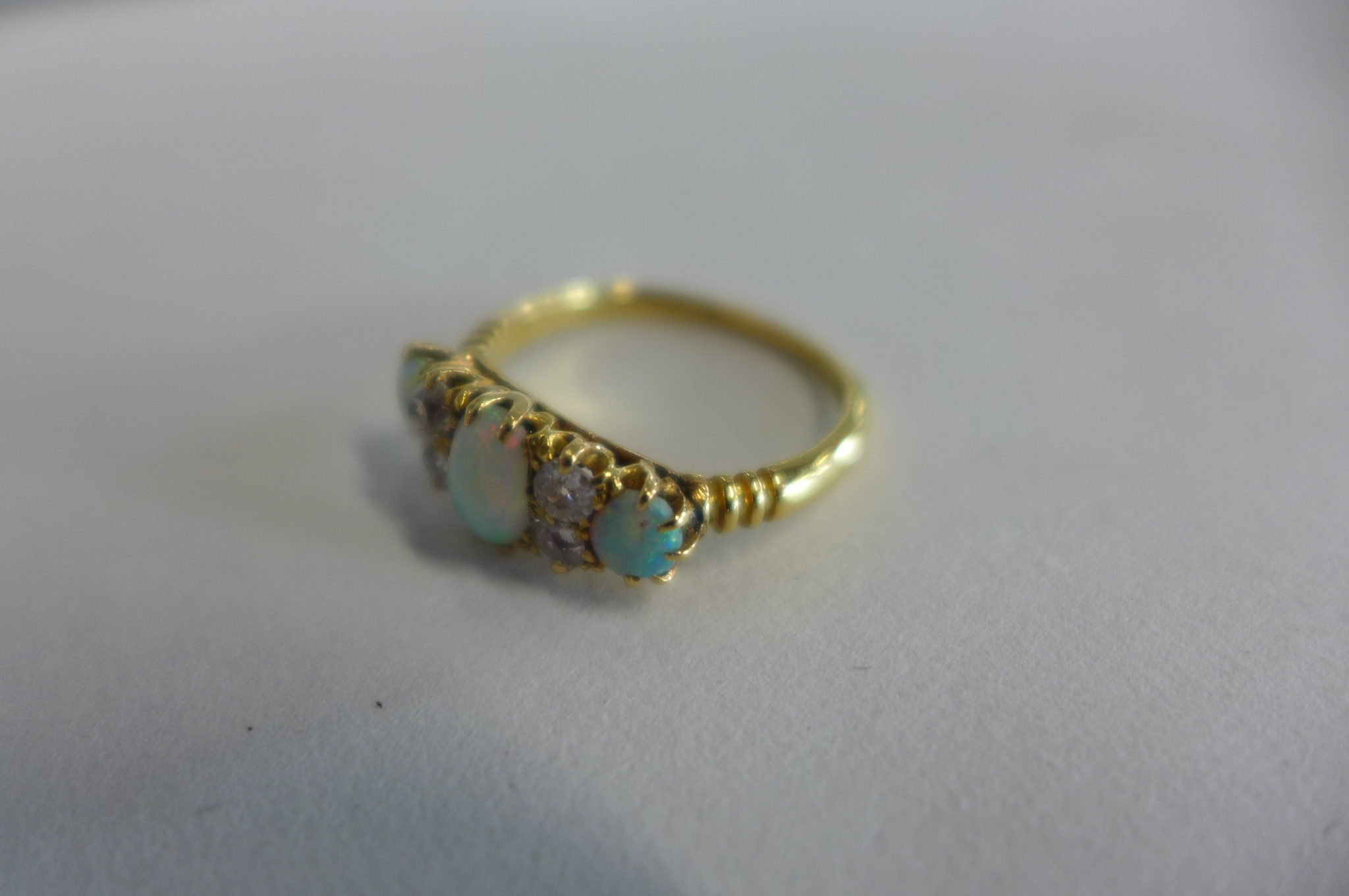 A yellow gold opal and diamond ring, tests to approx 18ct, ring size N, approx 3.2 grams, opals - Image 2 of 3