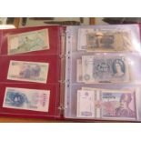 100 world banknotes in an album