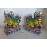 A pair of Chinese ceramic multi coloured dogs of Fo - 33cm tall, with travel box, some overall