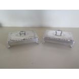 A near pair of Dutch trinket boxes, one in dutch silver, the other plated, 3.5cm tall x 13cm x 9cm -