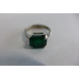 An 18ct white gold emerald ring, cut emerald approx 3.3ct, ring size M, approx 4 grams, general wear