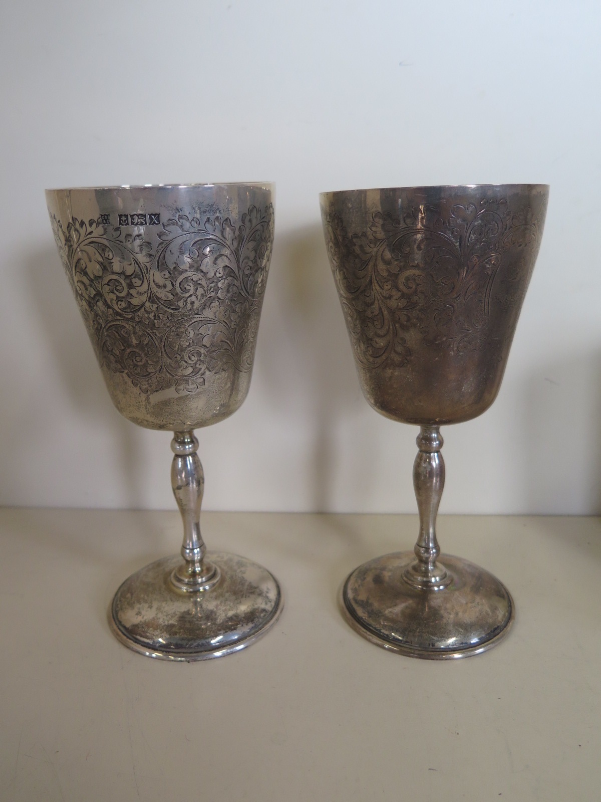 A pair of silver goblets, Birmingham 1972, approx 17.5 troy oz, approx 17.8cm high, usage marks