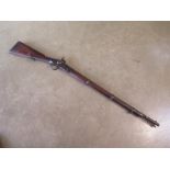 A percussion cap rifle, stamped -LSA 1868- and -Manton and Co Calcutta and London-