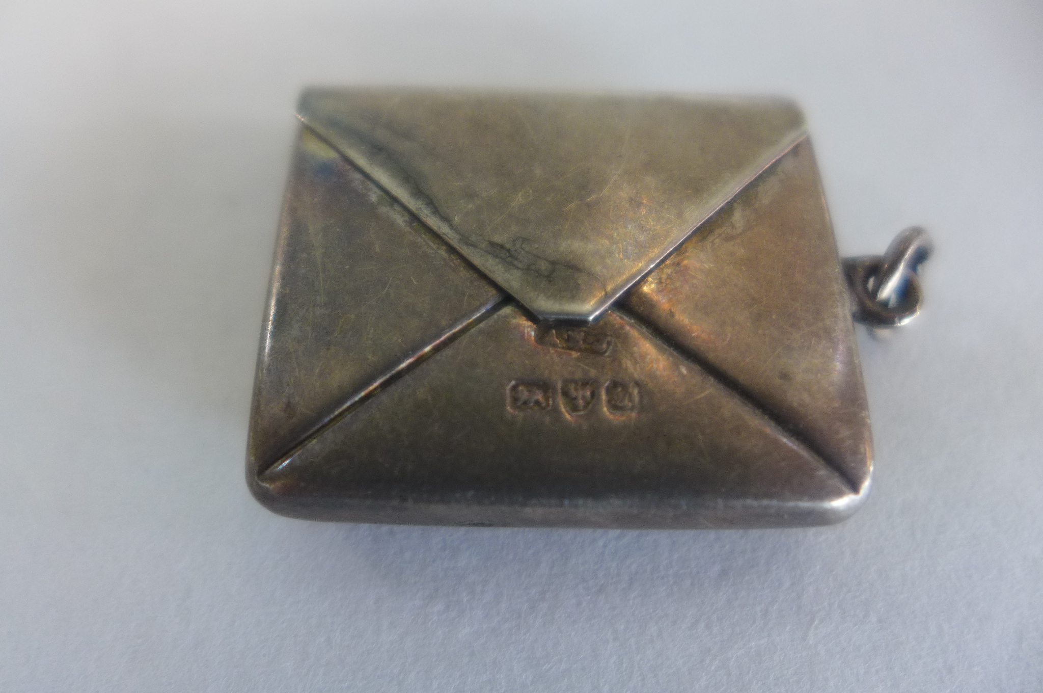 A silver pill box, Birmingham 981, maker PGK, 5.5cm long, and a silver envelope stamp case, 3cm - Image 2 of 7