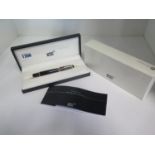 A Mont Blanc - Ruby - rollerball pen with box and instructions, in good condition, needs a refill