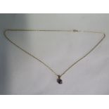A Tourmaline pendant on 9ct chain, approx total weight 5.4 grams, in good condition
