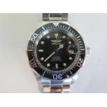 A gents automatic Invicta 200m divers watch in steel, good condition and working order, see
