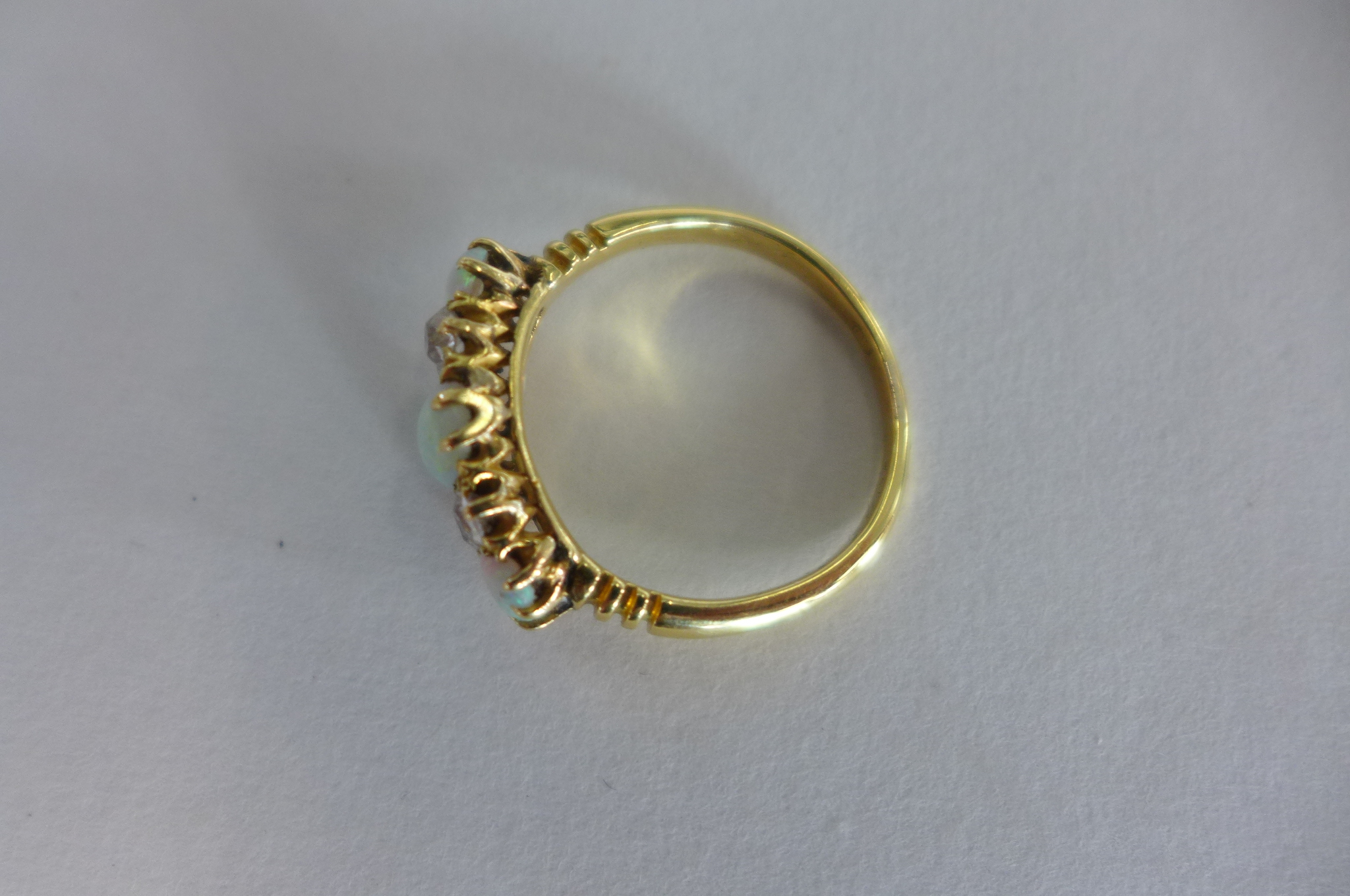 A yellow gold opal and diamond ring, tests to approx 18ct, ring size N, approx 3.2 grams, opals - Image 3 of 3