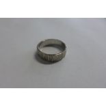 An 18ct white gold ring, size K, approx 3.7 grams, in good condition