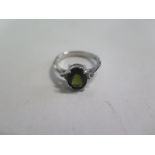 A 9ct white gold green garnet ring, size N, approx 3.3 grams, in good condition