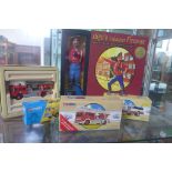 Four Corgi boxed fire engines and a gearbox action figure 1850 - volunteer fireman, all boxed and