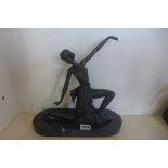 A bronze Art Deco style lady on a black marble base, 30cm tall, in good condition