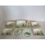 Four pieces of Clarice Cliff, a Newport Pottery rural scenes trio and a Ye Olde Willow sugar