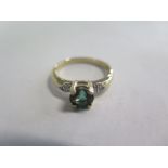 A 9ct green garnet ring, size H, approx 2.6 grams, in good condition