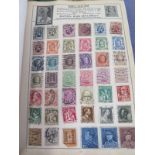 Twelve stamp albums of British and international stamps, with some loose, includes Iraq, Iran and US