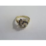 An 18ct gold diamond and sapphire cluster ring, size P, approx 7g, diamonds bright in good condition