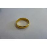 A 22ct gold ring, approx 4.5 grams, ring size M, overall in good condition, some usage marks